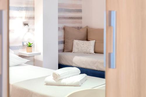 Ein Bett oder Betten in einem Zimmer der Unterkunft Terre Bianche