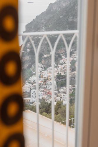a view of a city from a window at Five Positano in Positano