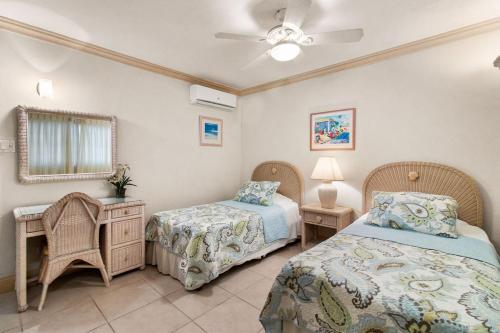 En eller flere senge i et værelse på Mistle Cove 102