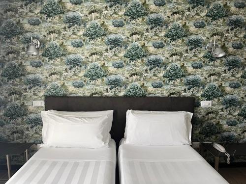 Hotel Napoleonにあるベッド