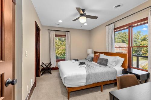 a bedroom with a bed and a ceiling fan at Douglas Retreat in Douglas