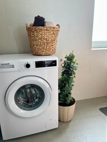 a washing machine with a basket on top of it at Apartment Nähe Red Bull Ring in Knittelfeld