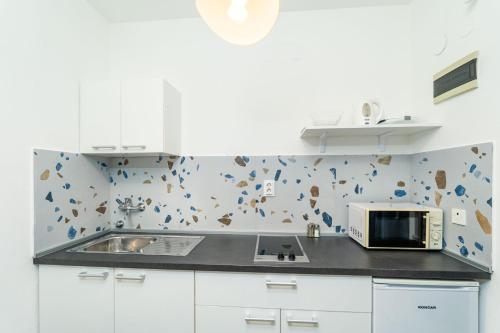 Η κουζίνα ή μικρή κουζίνα στο Apartment Fiorenini