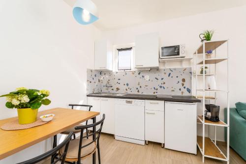 Η κουζίνα ή μικρή κουζίνα στο Apartment Fiorenini