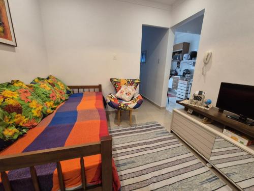 โทรทัศน์และ/หรือระบบความบันเทิงของ Apartamento na Praia