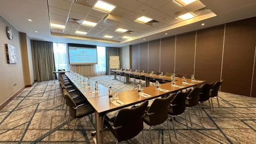 a conference room with a long table and chairs at Crowne Plaza Reading in Reading