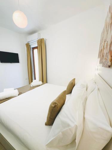 Paradise Roomsにあるベッド