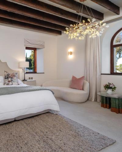 Ένα ή περισσότερα κρεβάτια σε δωμάτιο στο Steenberg Hotel & Spa