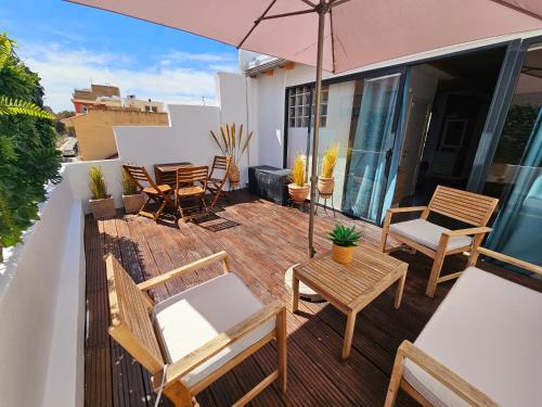 En balkon eller terrasse på Apartamentos de la Huerta