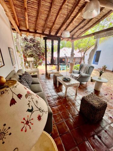 a living room with a couch and a table at Casa Bakero in Barichara