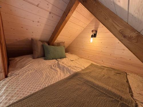 Voodi või voodid majutusasutuse Tiny house Pálava toas