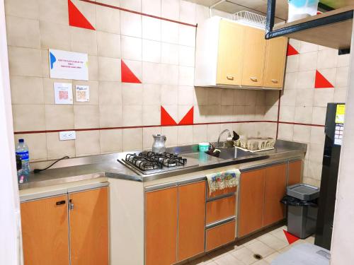 Kuchyň nebo kuchyňský kout v ubytování Ayllu Hostel