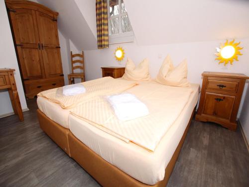 Ein Bett oder Betten in einem Zimmer der Unterkunft Holiday home in Wernigerode with a shared pool