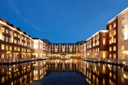 a view of a canal between two buildings at Hotel Europe Huis Ten Bosch in Sasebo