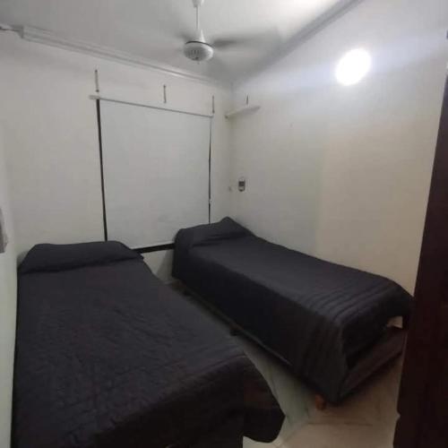 a bedroom with a bed in a room at Casa CNH 2 in Santiago del Estero