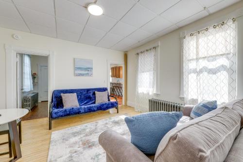 a living room with a couch and a table at half Mi to Ocean Cozy Apt in Old Orchard Beach in Old Orchard Beach