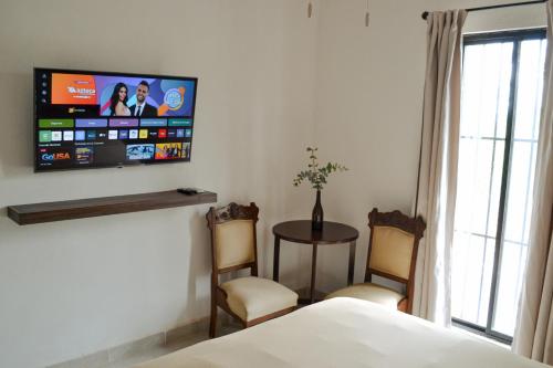 TV a/nebo společenská místnost v ubytování Finca Vitali