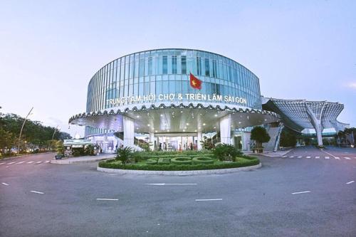 a building with a sign on the front of it at Collection O Sunshine Garden Hotel - Near SECC in Ho Chi Minh City