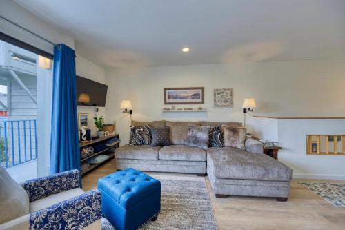 a living room with a couch and a blue stool at 217W 217 Whittley Ave in Avalon