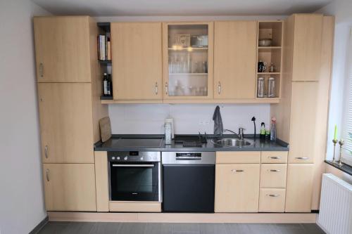 Dapur atau dapur kecil di Apartment mit Charme