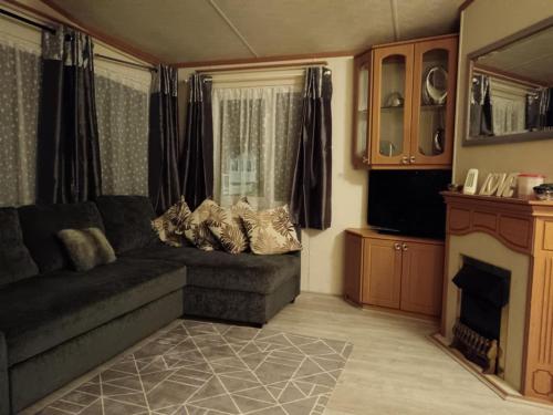 Χώρος καθιστικού στο Lovely 3 bedroom 8 berth caravan in Rhyl