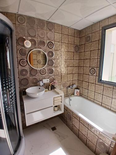 Un baño de Villa Perle mémorable séjour vous attendent