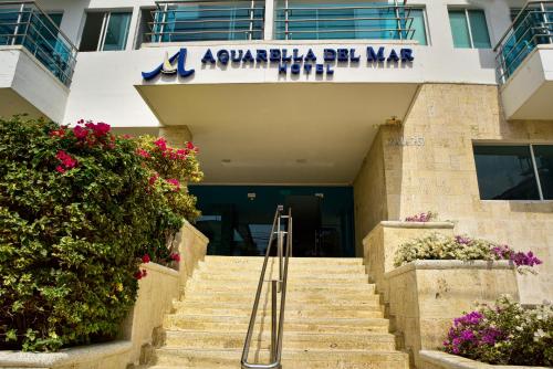 a set of stairs leading up to a building at HOTEL AQUARELLA DEL MAR in Santa Marta