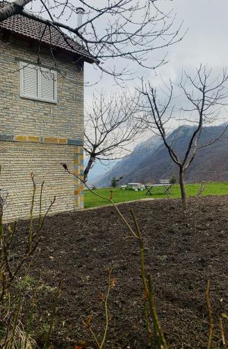 a brick building with a window on the side of it at Villa Tomorrow in Ujanik