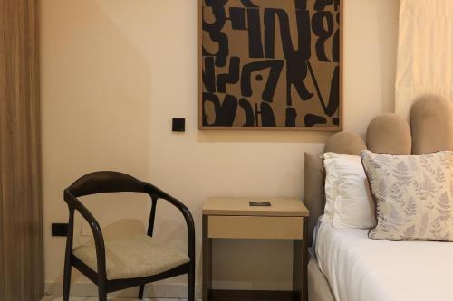 Ένα ή περισσότερα κρεβάτια σε δωμάτιο στο George Residence - Ikoyi, Lagos