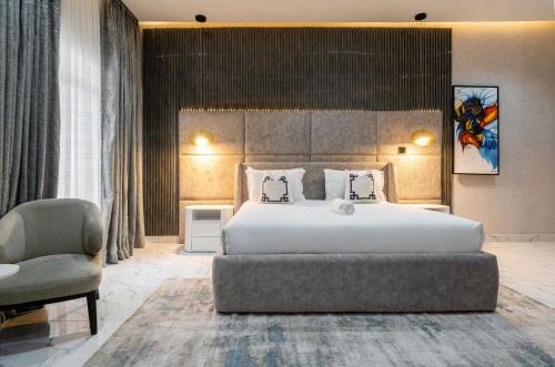 Ένα ή περισσότερα κρεβάτια σε δωμάτιο στο George Residence - Ikoyi, Lagos