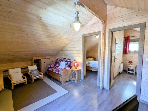 Postel nebo postele na pokoji v ubytování Chalet cosy à La Bresse avec WIFI et parking, proche pistes - FR-1-589-310