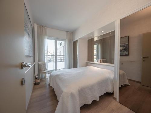 Ένα ή περισσότερα κρεβάτια σε δωμάτιο στο Apartment in Knokke near the Beach