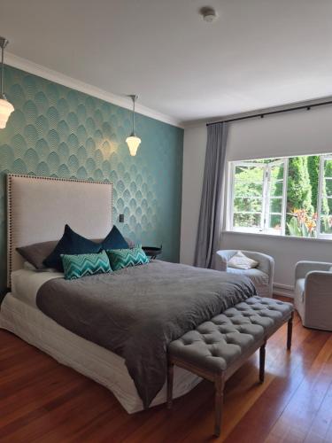 Katil atau katil-katil dalam bilik di Meadowood Art Deco Home