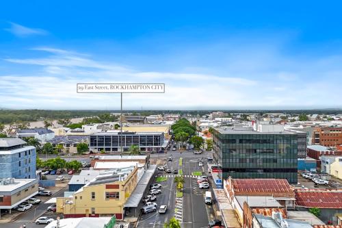 an aerial view of a city with a street at Rockhampton Inner City Apartment in Rockhampton