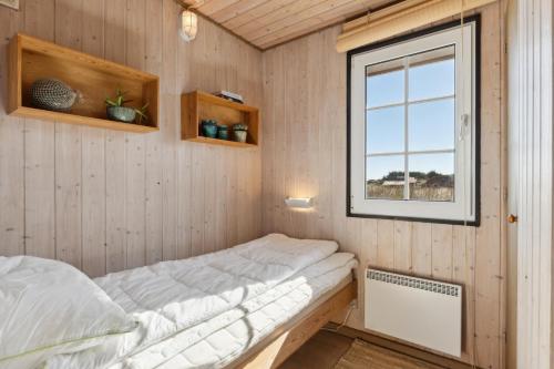 Postel nebo postele na pokoji v ubytování Feriehus 1114