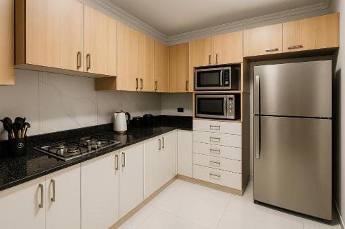 Kuchyň nebo kuchyňský kout v ubytování KweG