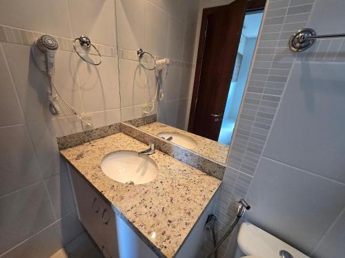 Koupelna v ubytování Apto com 2 suítes e ótima área de lazer - até 10 pessoas