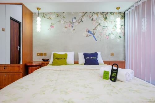 Кровать или кровати в номере Urbanview Syariah Soul Sanctuary near Stasiun Purwokerto