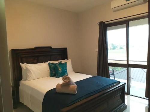 Ένα ή περισσότερα κρεβάτια σε δωμάτιο στο Apt 1 Great mountain views In Nadi, My Ecolodge