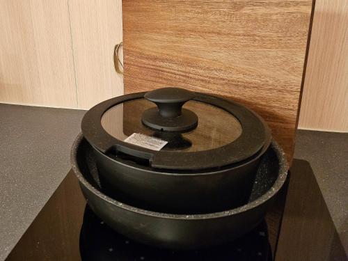 a black pot sitting on top of a counter at MKG HOTEL Asakusa in Tokyo