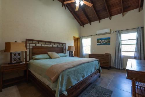 Postel nebo postele na pokoji v ubytování Casa De Odisea