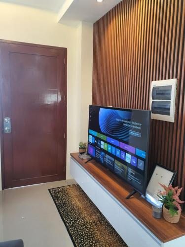 Calm Oasis Dauis-Panglaoにあるテレビまたはエンターテインメントセンター
