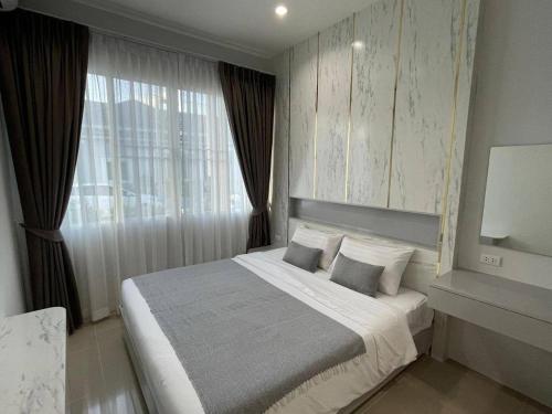 Katil atau katil-katil dalam bilik di The Rich Villas Palai