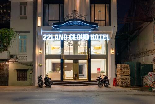a group of motorcycles parked outside of a store at Cloud 22Land hotel in Hanoi