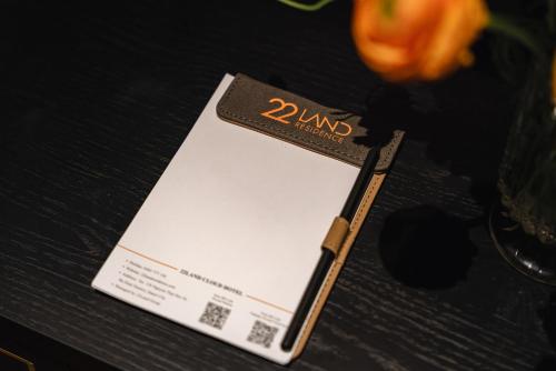 a book sitting on top of a table at Cloud 22Land hotel in Hanoi
