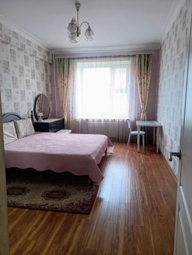 Llit o llits en una habitació de Central 25