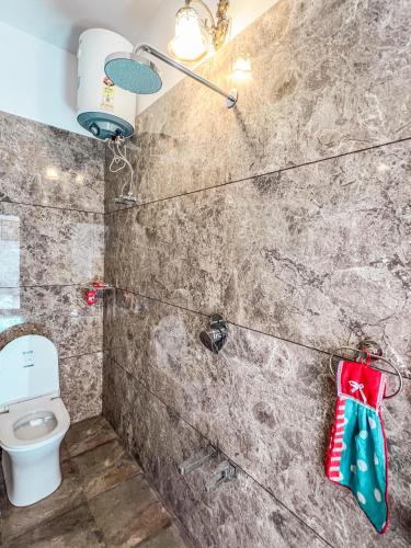 a bathroom with a toilet in a room at Ardas Villa Bikaner - Heritage Luxury Boutique Stay in Bikaner