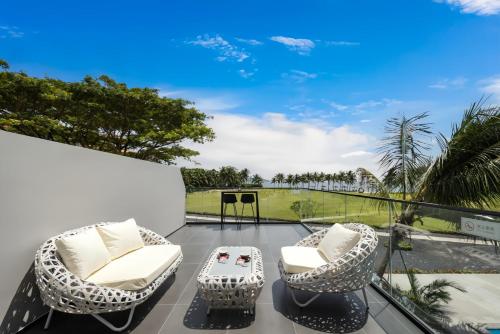 Κήπος έξω από το Hainan Ease Ocean Retreat