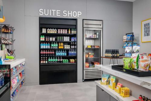 a store with a surface shop sign in a store at Homewood Suites By Hilton Newport Cincinnati in Newport