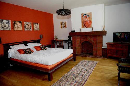 Кровать или кровати в номере Au Coeur De Beauvais